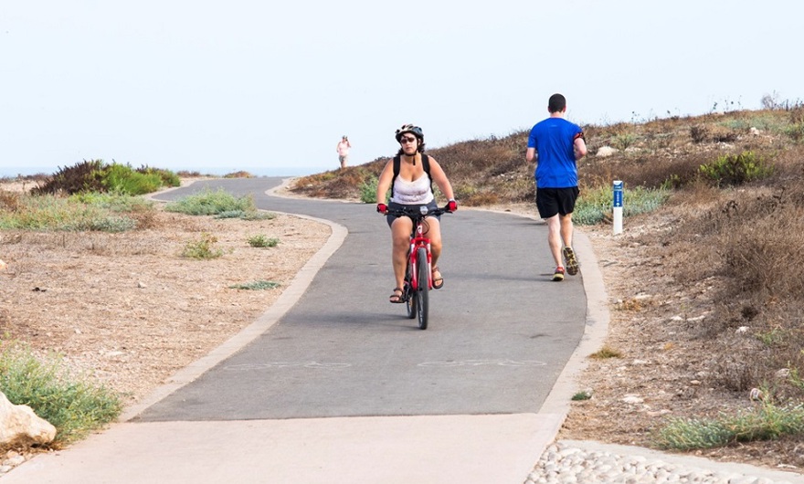 Woman riding a bike in the park