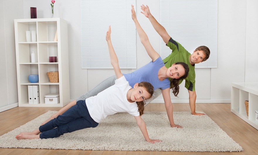 Family exercising at home